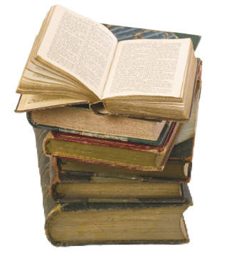 Pino kirjoja, päällimmäisenä ranskankielinen Raamattu. Kuva ©: iStockPhoto.com/duncan1890