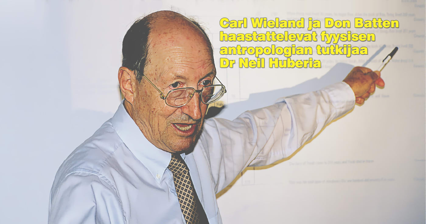 Kuva Dr. Neil Huberista, ja teksti 'Carl Wieland ja Don Batten haastattelevat fyysisen antropologian tutkijaa Dr Neil Huberia'. Kuva ©: creation.com
