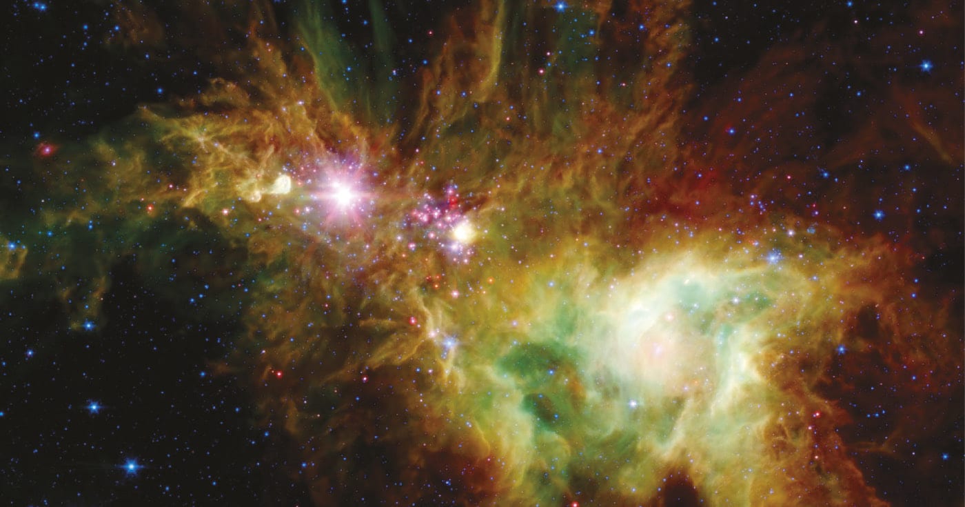 Monivärisessä kaasusumussa tähtiä. Kuva ©: NASA, JPL – Caltech, P.S. Teixeira (CfA)